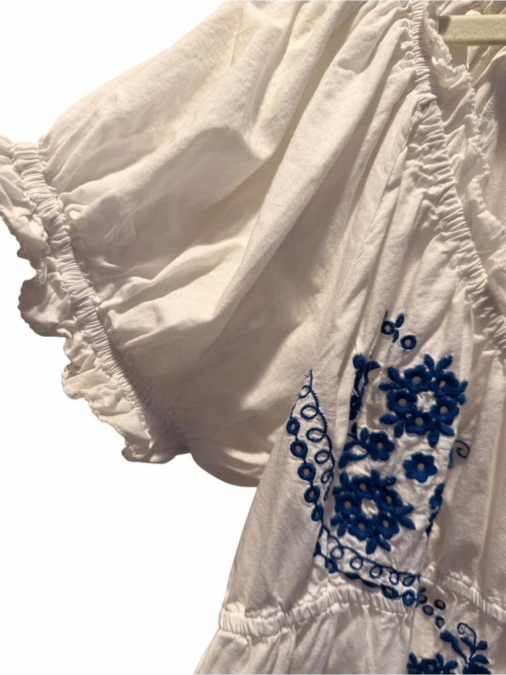 Anthropologie White Babydoll Top with Blue Embroidered Floral Detail Medium